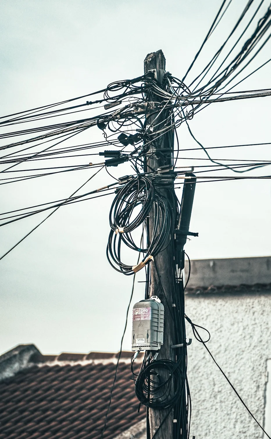 Dense network of telephone cables constraining communication